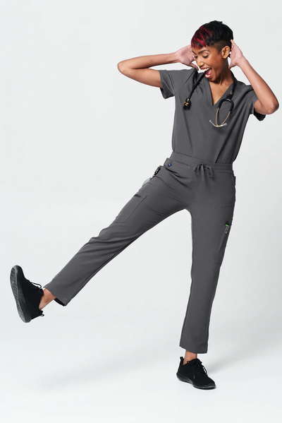 Healthcare worker wearing a shadow gray scrub uniform