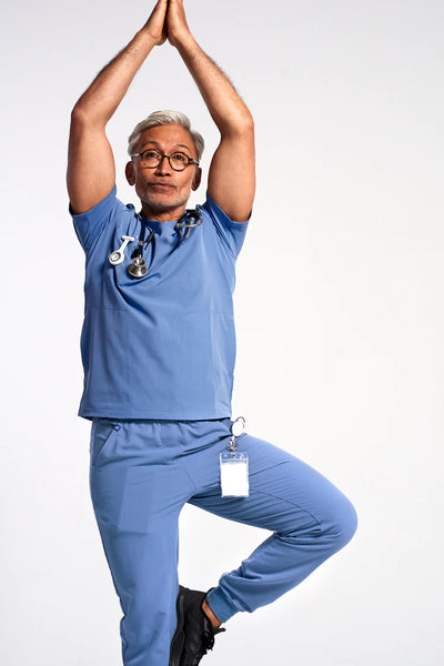Nurse wearing a Dr. Scrub Uniform in Ceil Blue