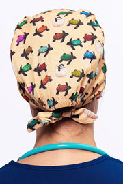 A Doctor wearing a Dr. Woof Sea Turtle Surgical Scrub Cap Tie Back
