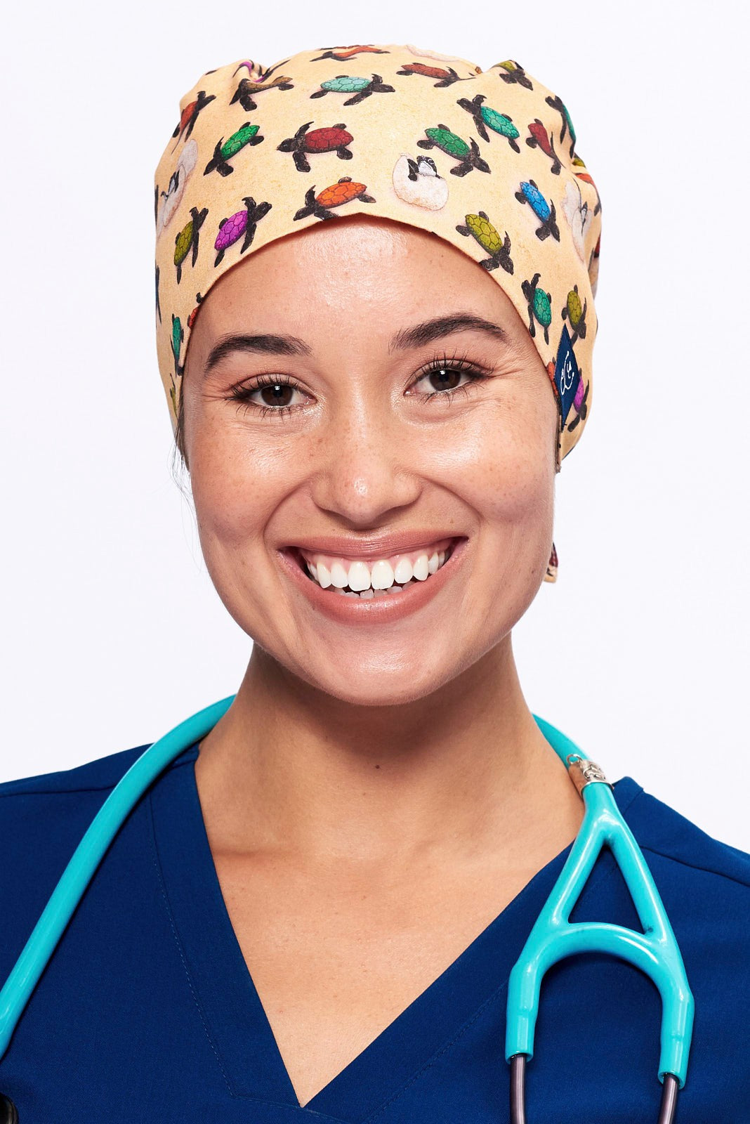 A Doctor wearing a Dr. Woof Sea Turtle Surgical Scrub Cap Tie Back
