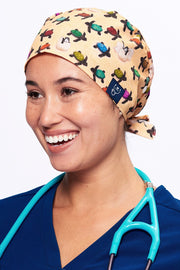 A Doctor wearing a Dr. Woof Sea Turtle Surgical Scrub Cap Tie Back