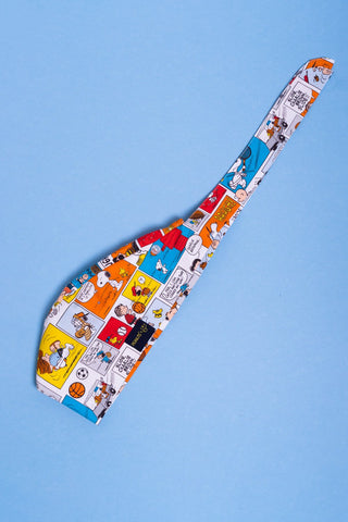 A Dr. Woof Peanuts Good Sport Surgical Scrub Cap