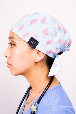 A Vet Wearing a Dr. Woof Fairy Floss Surgical Scrub Cap