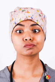 A Doctor Wearing a Dr. Woof Fruit Basket Surgical Scrub Cap