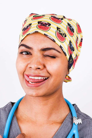 A Vet Nurse Wearing a Dr. Woof Pugs Surgical Scrub Cap