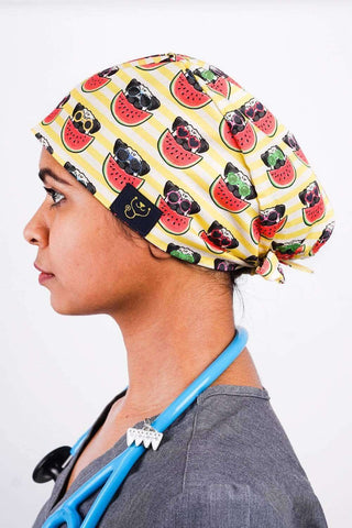 A Vet Tech Wearing a Dr. Woof Pugs Surgical Scrub Cap