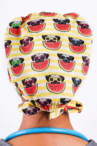 A Nurse Wearing a Dr. Woof Pugs Surgical Scrub Cap Tie Back