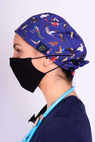 A Vet Med Wearing a Dr. Woof Exotic Birds Surgical Scrub Cap