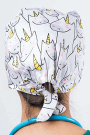 A Doctor Wearing a Dr. Woof Unicorn Surgical Scrub Cap